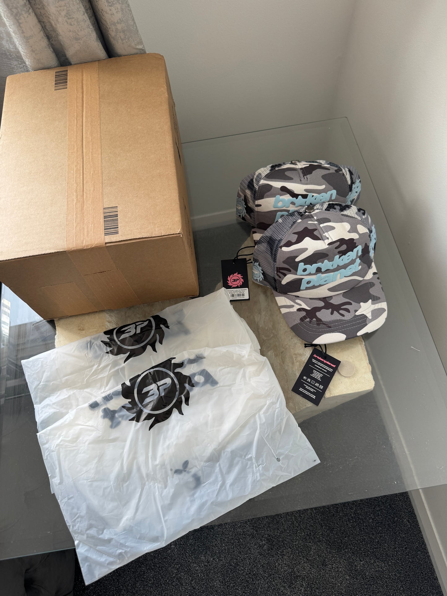Broken Planet Trucker Hat Heather Grey/Snow Star Camo