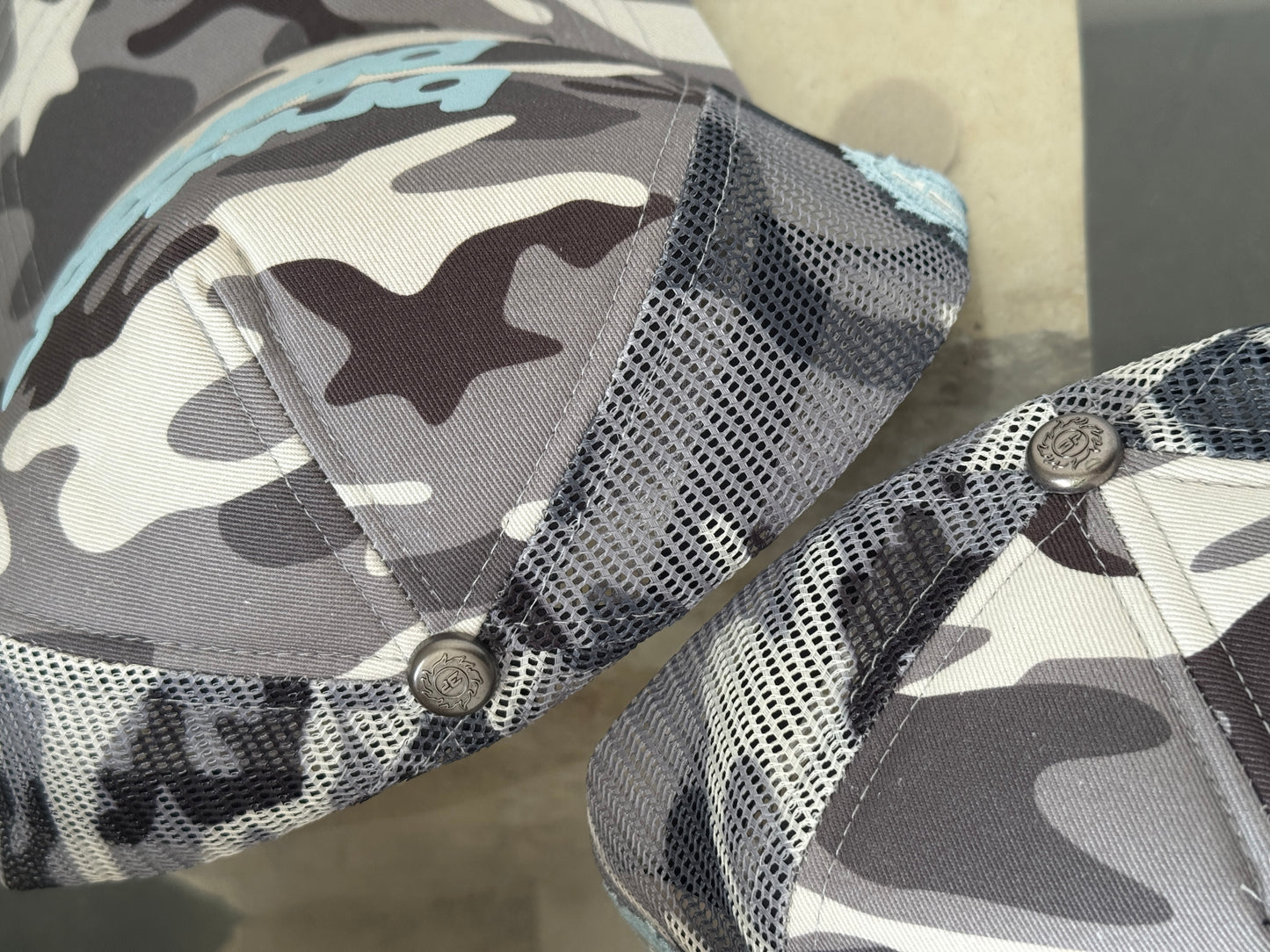 Broken Planet Trucker Hat Heather Grey/Snow Star Camo